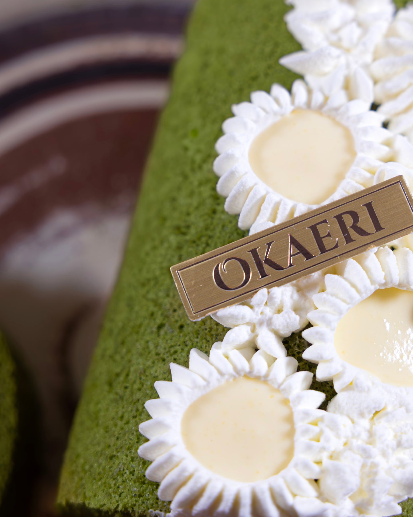 Marukyu Koyamaen Rich Matcha roll cake, fluffy matcha chiffon with rich matcha cream, and housemade yuzu curd, by Okaeri Bakery in London