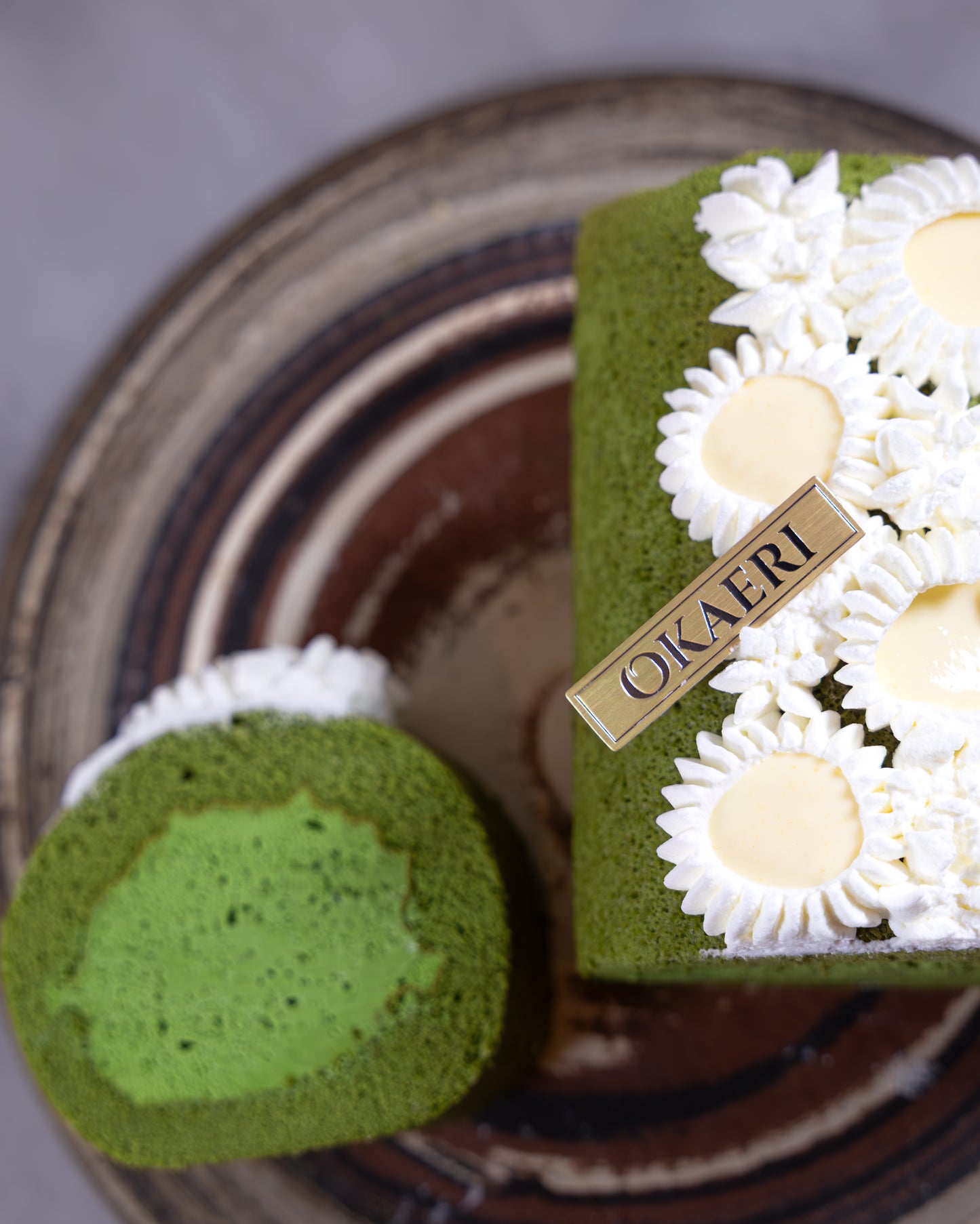 Marukyu Koyamaen Rich Matcha roll cake, fluffy matcha chiffon with rich matcha cream, and housemade yuzu curd, by Okaeri Bakery in London
